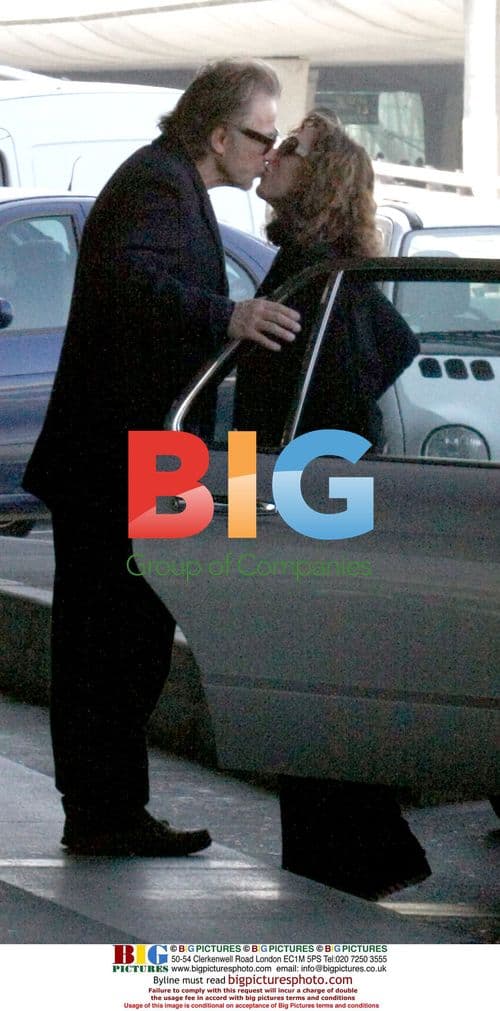 Harvey Keitel and wife leave hotel for airport