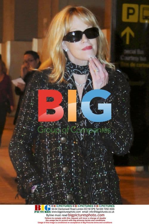 Melanie Griffiths arrives at Malaga airport