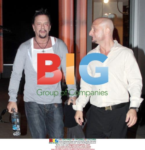 Mickey Rourke leaves gym with bloody face