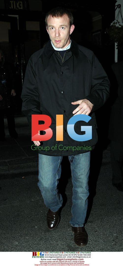 Guy Ritchie enjoys night out at bar