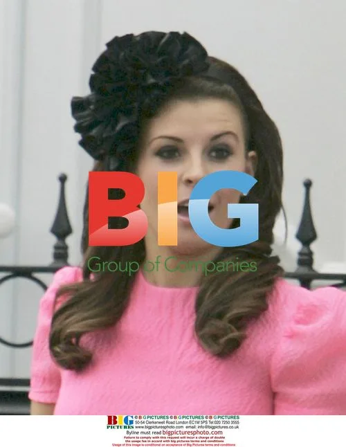 Coleen Rooney Leaves Home for Races