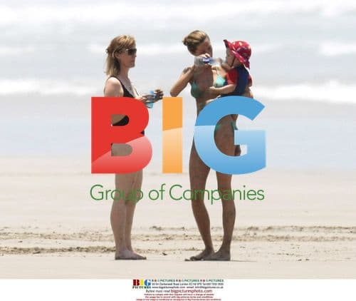 Tom Brady and Gisele Bundchen on Beach with Son