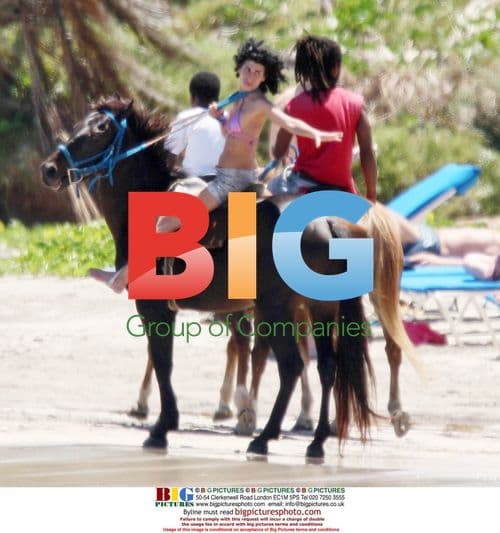 Amy Winehouse Rides Horse on St. Lucia Beach