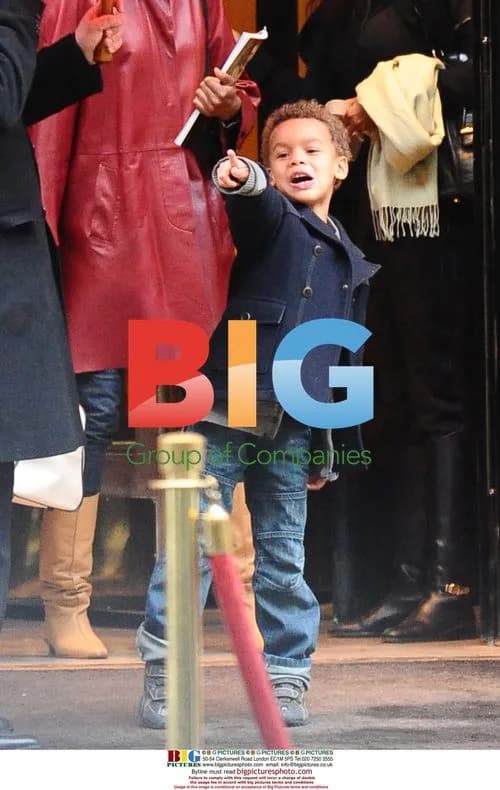 Nicole Coste and son Alexandre leave Paris hotel