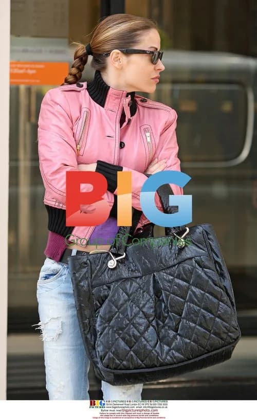 Elen Rives has a cigarette in London