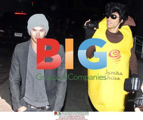 Kellan Lutz runs into banana-clad photographer