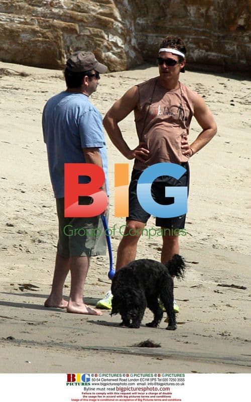 Matthew McConaughey jogging with dog on beach