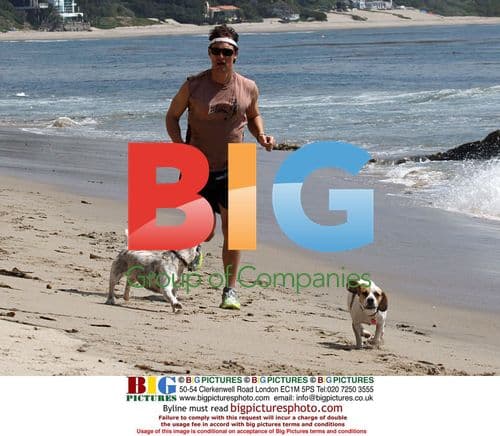 Matthew McConaughey with Dog on Beach