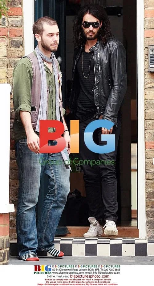 Russell Brand Leaves London Home with Mystery Girl