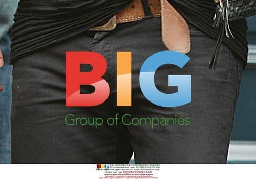 Russell Brand leaves home with mystery woman