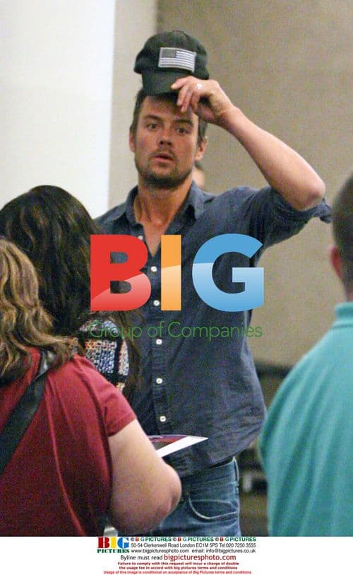 Fergie and Josh Duhamel arrive to LAX