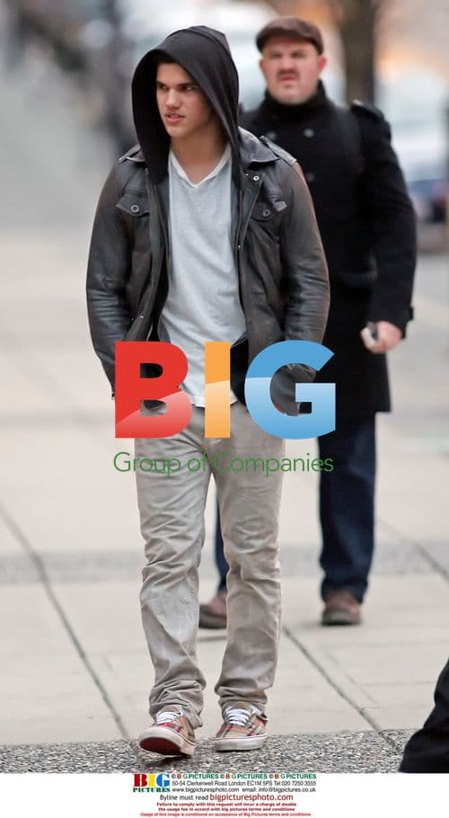 Taylor Lautner and Edi Gathegi stroll downtown Vancouver