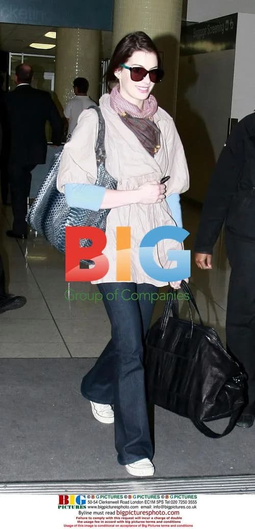 Anne Hathaway Exits LAX