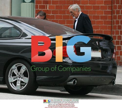 Dennis Hopper and Daughter Wait for Car