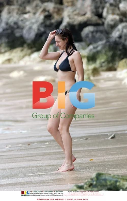 Kelly Brook in Black Bikini on Caribbean Vacation