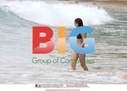 Kelly Brook in Black Bikini on Caribbean Holiday