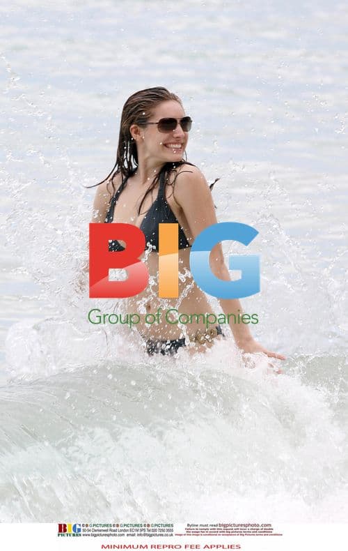 Kelly Brook in Black Bikini on Caribbean Holiday