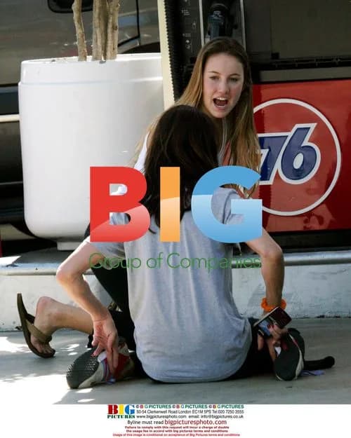 Janice Dickinson Pumping Gas After Workout