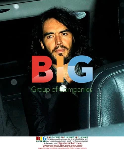 Russell Brand leaves Claridge's with blonde