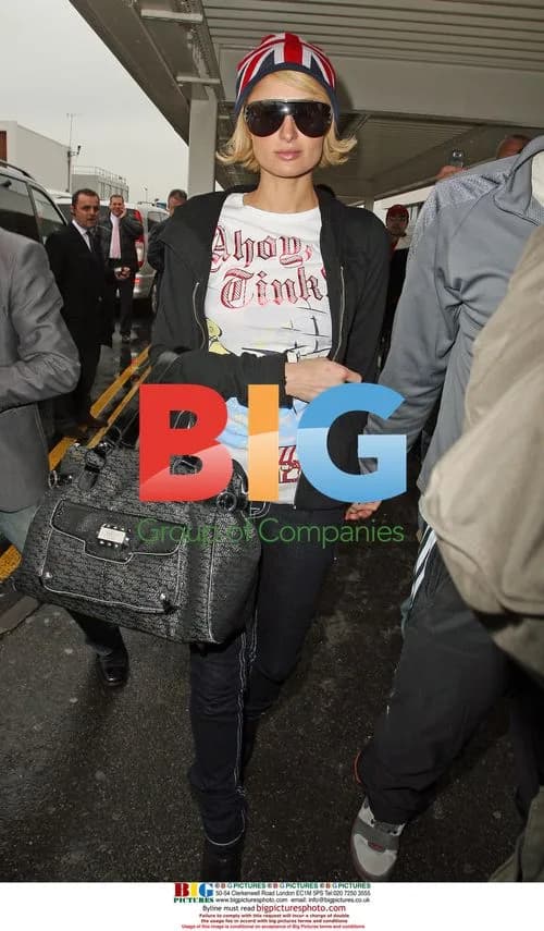 Paris Hilton and Doug Reinhardt at Heathrow