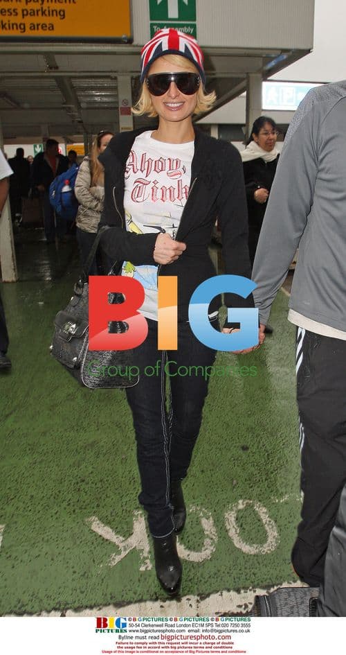 Paris Hilton and boyfriend at Heathrow