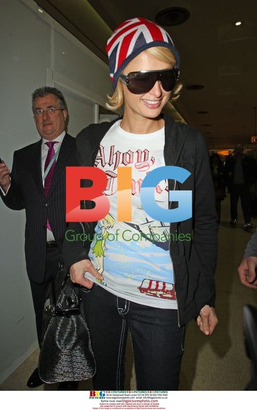 Paris Hilton and Doug Reinhardt at Heathrow