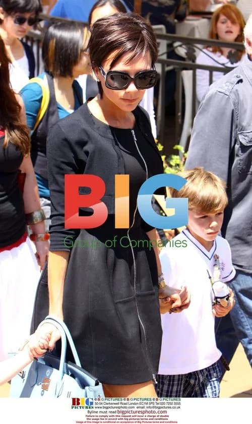 Victoria Beckham shopping with sons