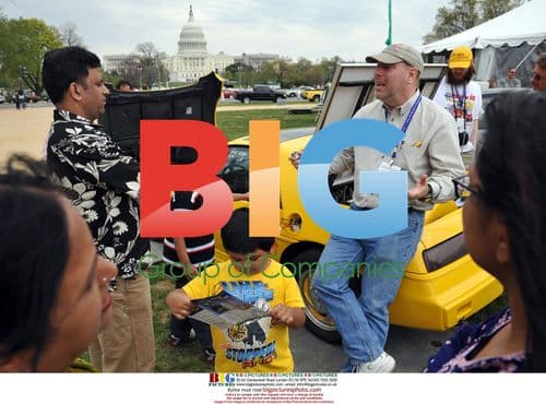 Man Talks Electric Vehicles on National Mall
