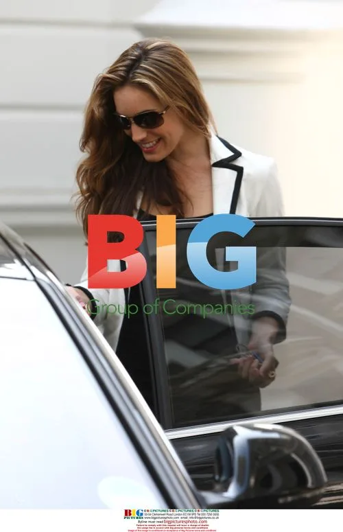Kelly Brook wearing ring at home