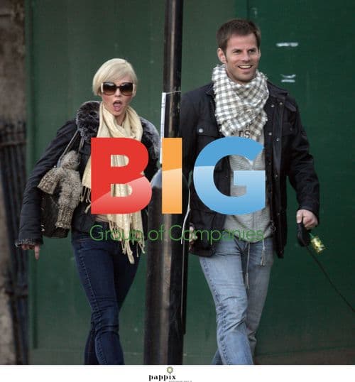 Ben Richards and girlfriend walk dog in London