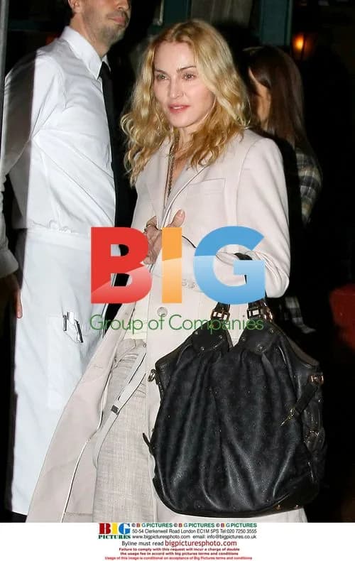Madonna dines with friend & Jesus Luz