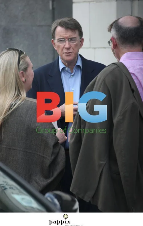 Mandelson checks phone before cinema with former aide