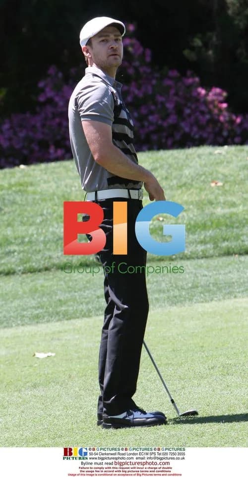 Justin Timberlake prepares to sink shot on 10th hole