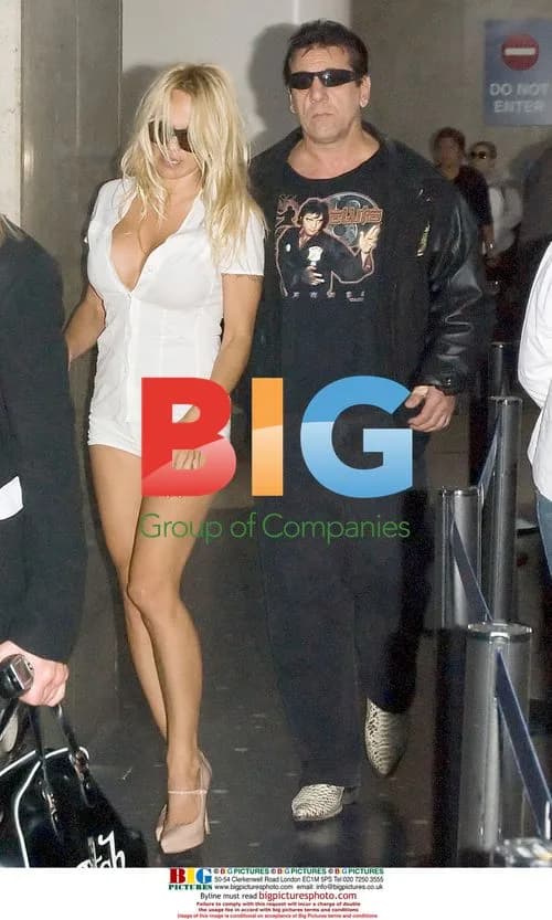 Pamela Anderson and Chuck Zito at LAX