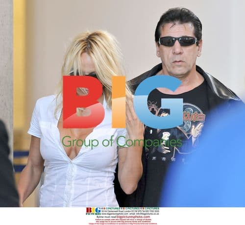 Pamela Anderson and Chuck Zito at LAX