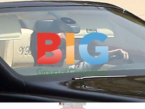 Victoria Beckham does school run in Bentley