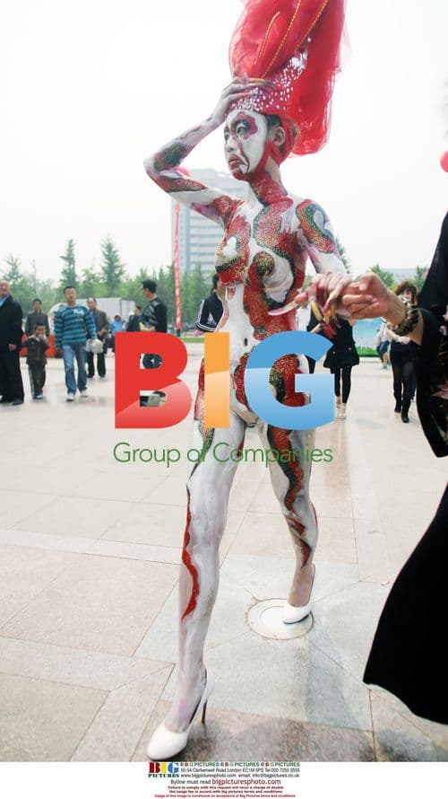 Girl with paint torch design walks in Jinan, China