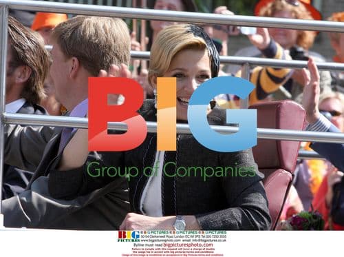 Car plows into Dutch royal parade