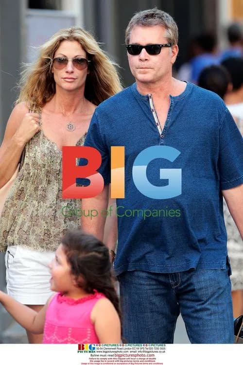Ray Liotta kisses girlfriend Catherine Hickland