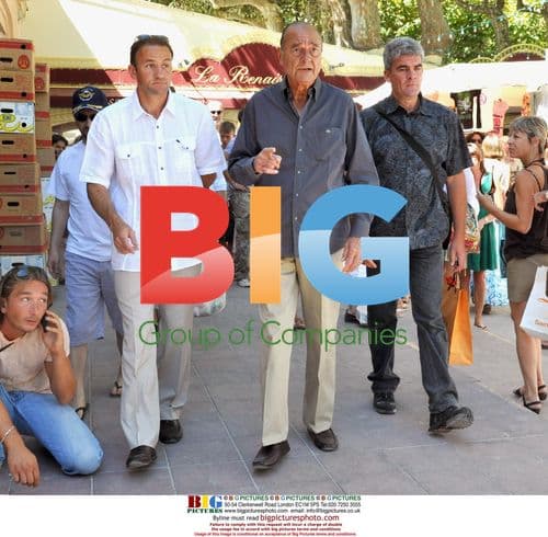 Jacques Chirac strolls with friends