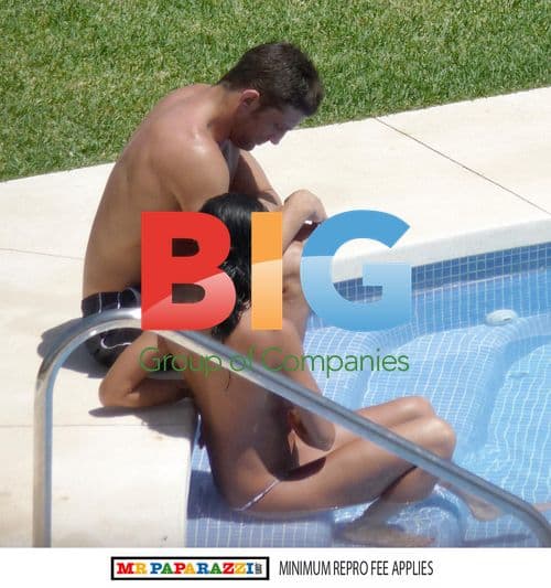 Katie Price relaxes with boyfriend Alex Reid