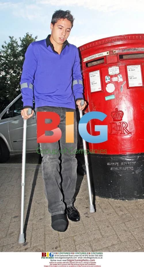 Samir Nasri on crutches after injury