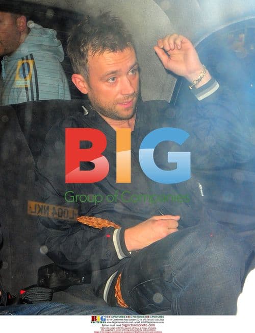 Damon Albarn grabs a cab in Covent Garden