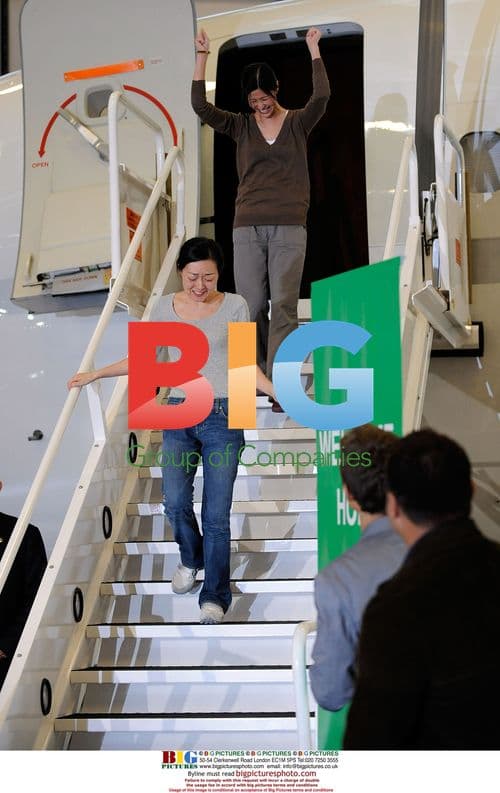 Journalists Laura Ling and Euna Lee return home