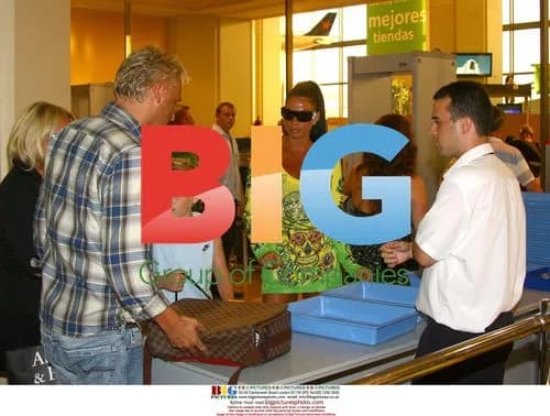 Katie Price arrives at Malaga airport