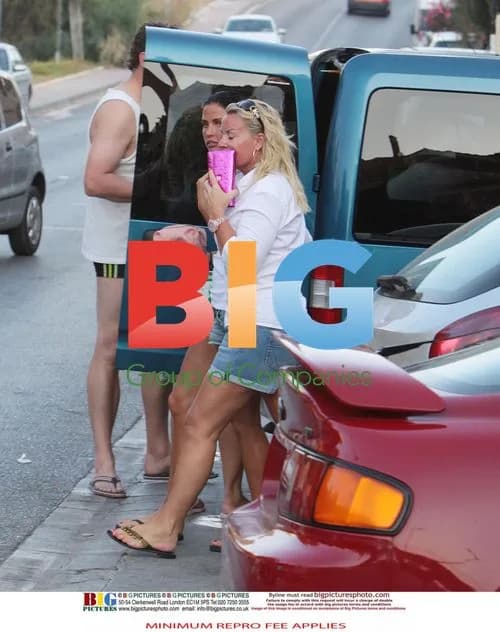 Katie Price Leaves Supermarket in Spain