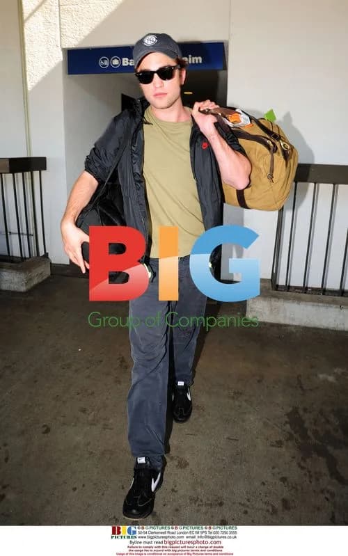 Robert Pattinson arriving at LAX