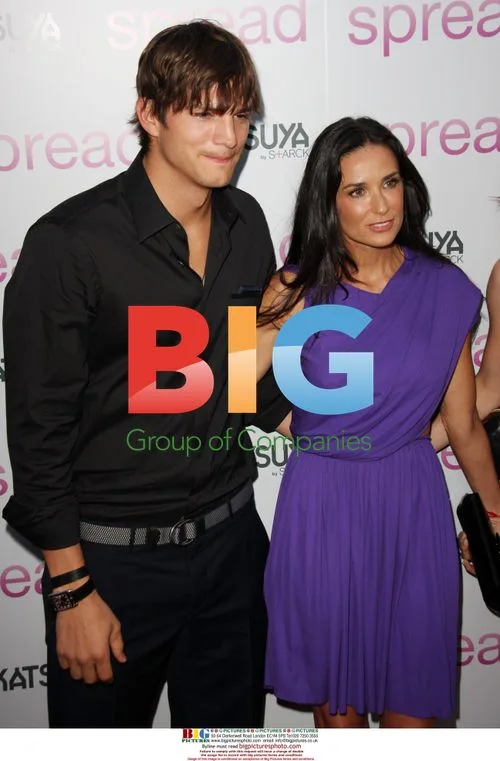 ASHTON KUTCHER and DEMI MOORE at Spread Premiere