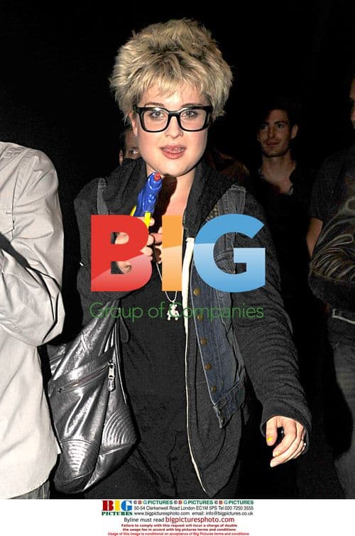 Kelly Osbourne and Luke Worrall play with water pistol