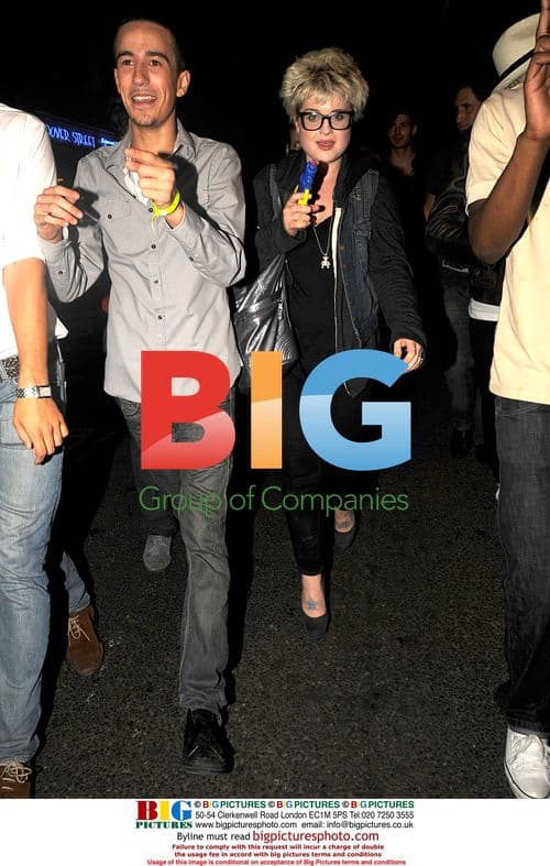 Kelly Osbourne and Luke Worrall play with water pistol